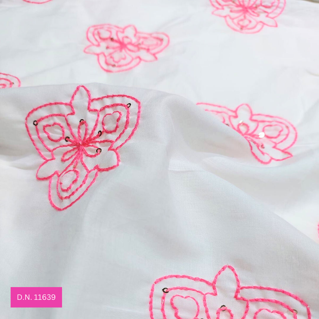 white embroidered cotton fabri