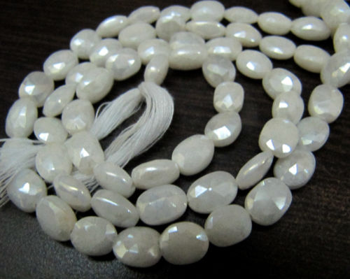 Natural Silverite Chalcedony10mm Oval Faceted Strand 14 inches long