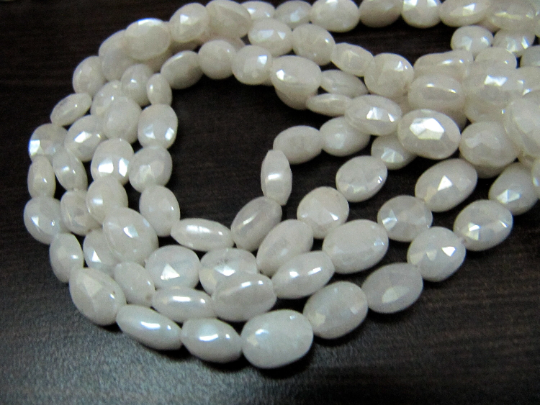 Natural Silverite Chalcedony10mm Oval Faceted Strand 14 inches long