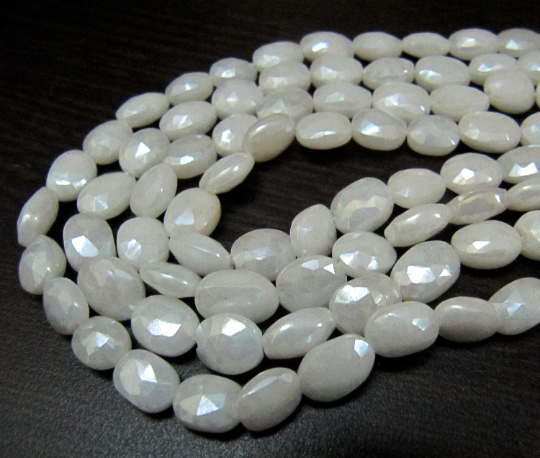 Natural Silverite Chalcedony10mm Oval Faceted Strand 14 inches long