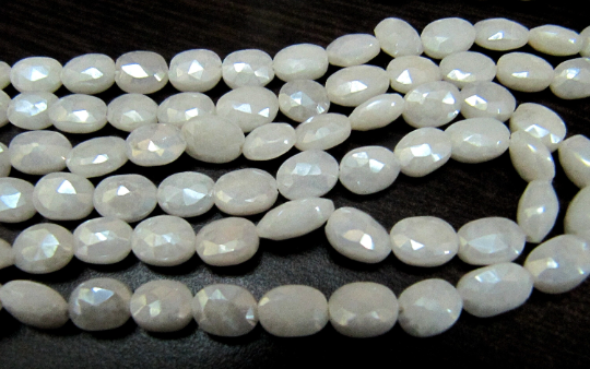 Natural Silverite Chalcedony10mm Oval Faceted Strand 14 inches long