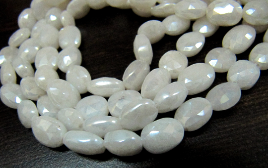 Natural Silverite Chalcedony10mm Oval Faceted Strand 14 inches long