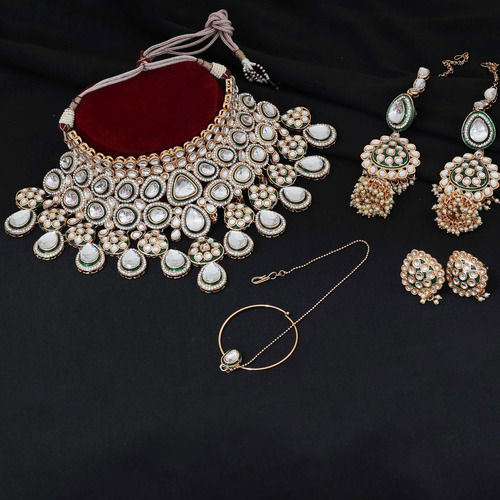 Dazzling Divinity kundan Semi Bridal Rose gold plated Jewellery Set  .