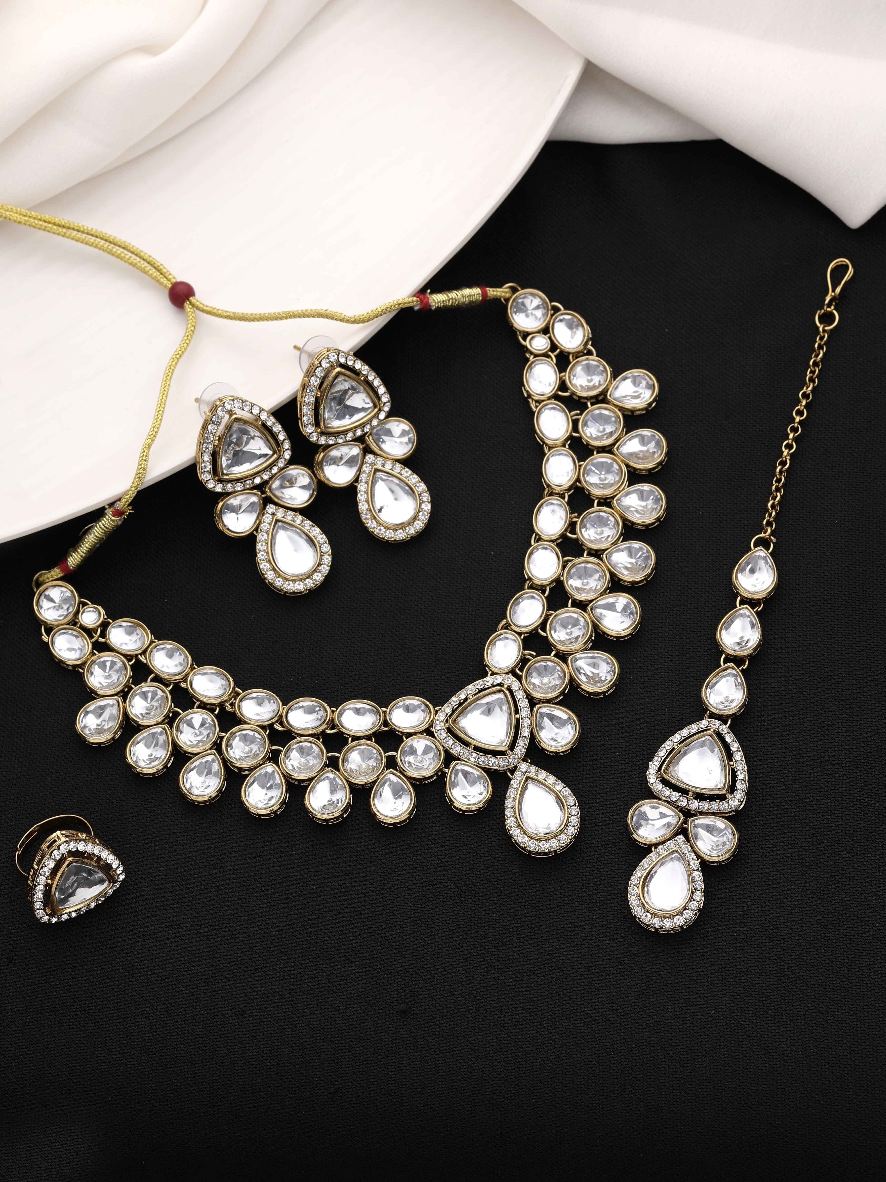 Tri-Luminous Kundan Choker Necklace Set...