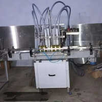 Bottle Liquid Filling Machine - Stainless Steel, 440 Volt (v) | Automatic Filling System, Electric Drive, Computerized Operation