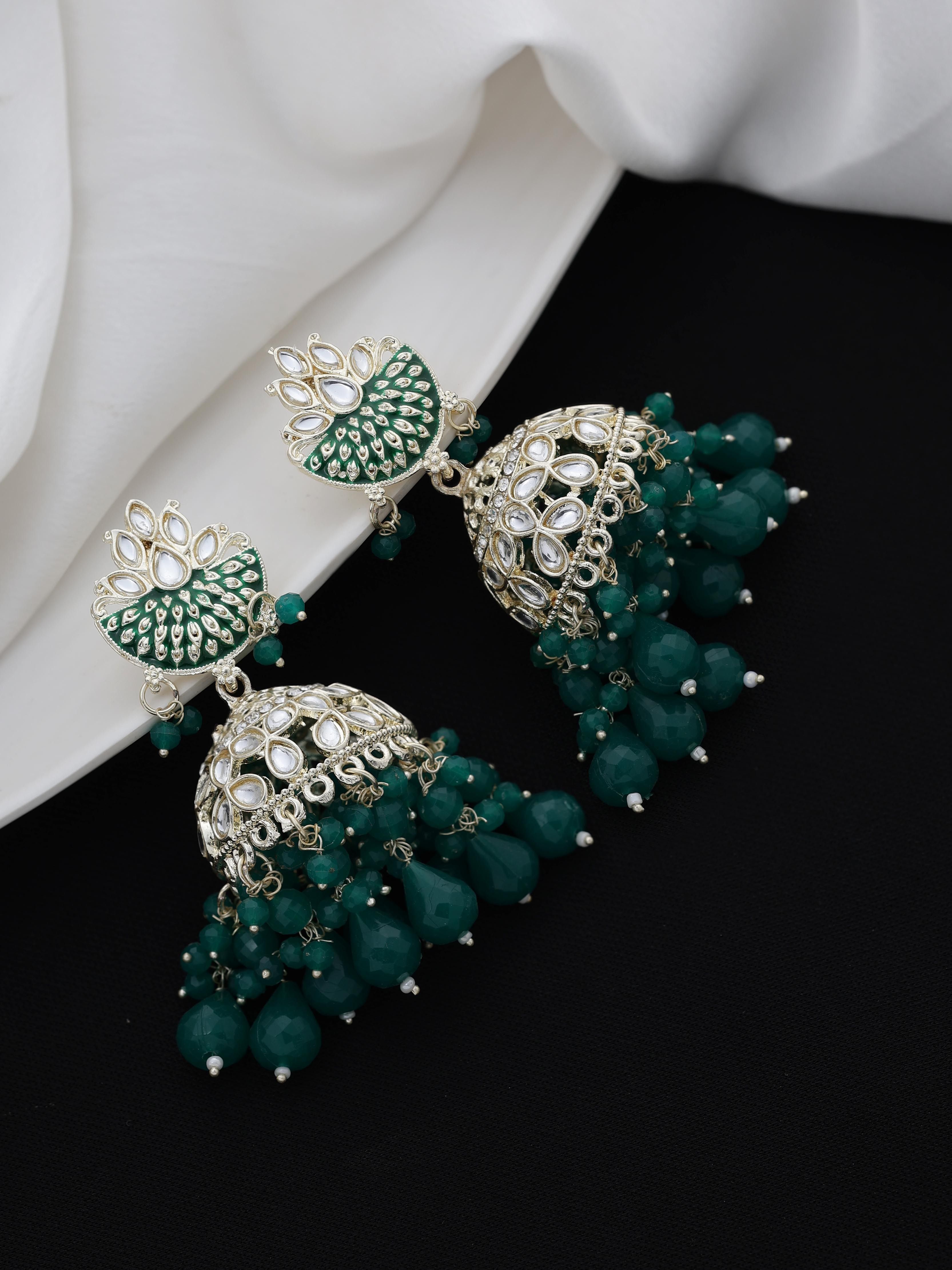 Meena Magic Kundan jhumki Earrings.