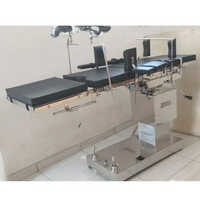 Hydraulic Operation Table - Stainless Steel, 600-900 Mm | Durable, Ergonomic, Height Adjustable, Rotating, Tilting, On Casters, Sleek Silver And Black Design