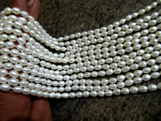 Natural Fresh water Pearl Rice White Pearl 5X7mm Beads Strand 15 inches Long