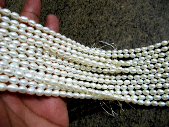 Natural Fresh water Pearl Rice White Pearl 5X7mm Beads Strand 15 inches Long