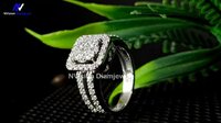 White Gold Diamond Cluster Solitaire Ring. - Diamond Carat Weight: 1.04 Carat
