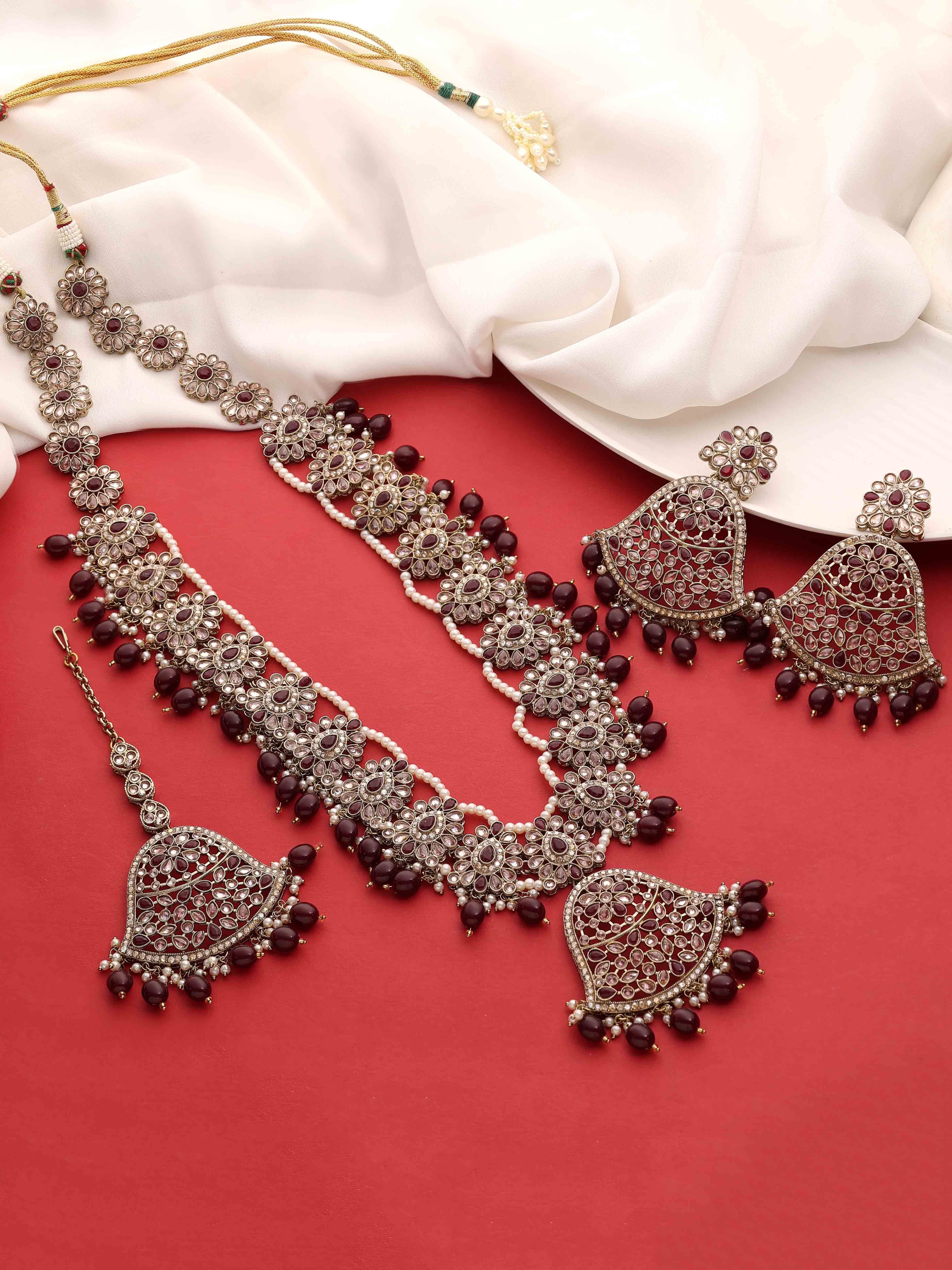 Traditional Mehandi plated Reverse AD Pearl Studded Long Necklace Set.