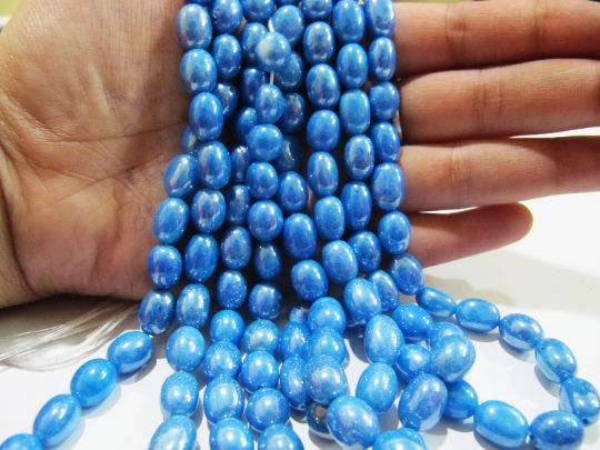 Mystic Coated Blue Topaz Dyed Quartz Oval Plain 8 to 10mm Beads Strand 8''long