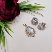 Shimmering Leafy Style American Diamond Locket Set