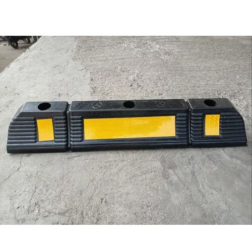 Car Wheel Stopeer - Color: Black With Yellow Reflective Strip.