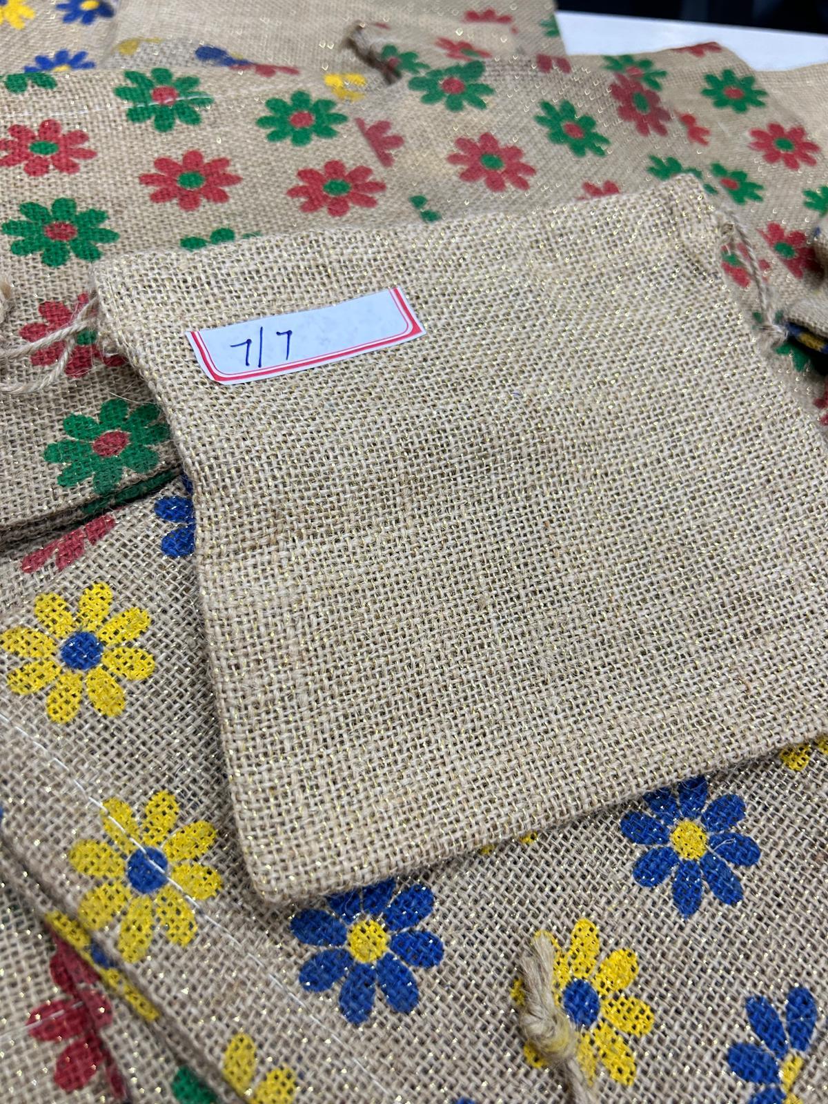 Stylish Flower Printed Natural Jute Pouch for Shopping Elegant Eco-Friendly Bags .