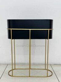 BLACK PLANTER WITH GOLDEN STAND