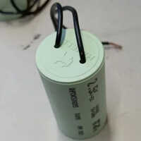2.5 Mfd Havells Capacitor - Cylindrical Design, Green Color | 1 Year Warranty For Reliable Performance