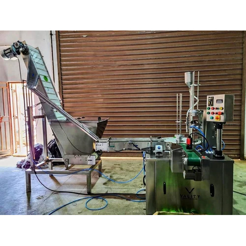 Induction Cap Wad Inserting Machine