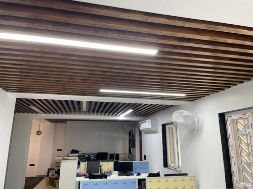 Perforated wooden baffle ceiling