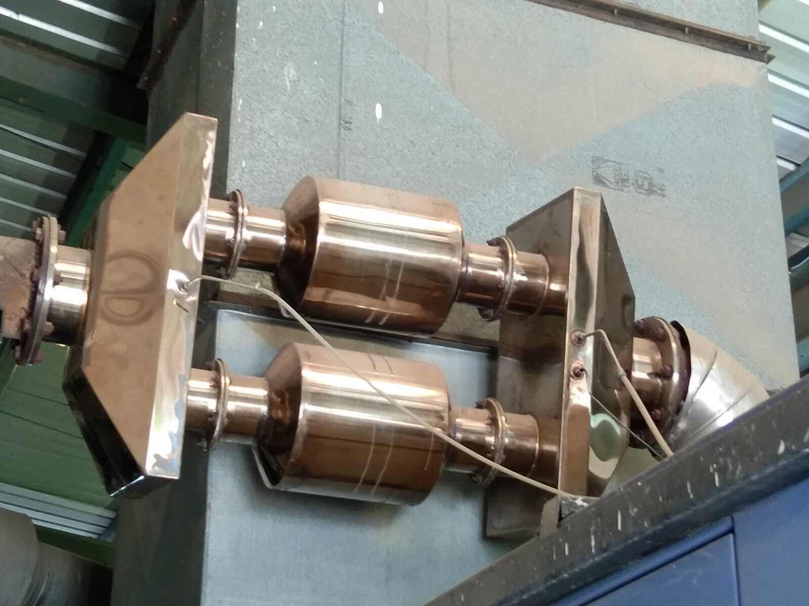 Emission Control System - Efficiency: 99.9%