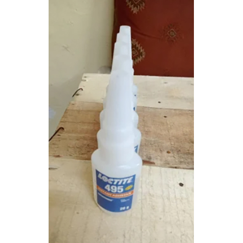 Loctite 401 Instant Adhesive - Industrial Grade Liquid, 95-98% Purity, Transparent Bonding Solution For Rubber, Metal, Plastic, And Wood