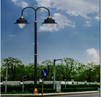 Cast iron lamp pole with double arm bracket