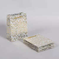 Printed Paper Gift Bag - Corrugated Board, 16.5x21.5x9 Cm, White & Golden | Eco-friendly, Customizable Designs, Max Load 2 Kg