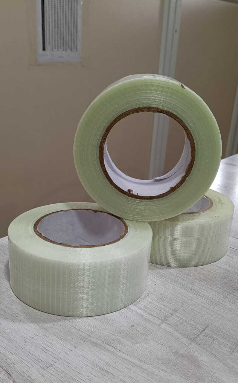 Cross Filament Tape - Polyester Film And Glass Yarn, 50mm Width X 140-150 Micron Thickness, Cross Transparent Color | Heavy Duty Packaging, Hot Melt Adhesive, Moisture Resistant, Strong Adhesive, 40% Elongation, 6 Months Shelf Life