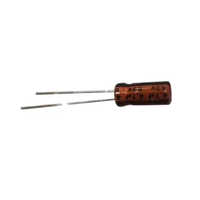 Plastic Electronic Capacitor - Round Shape, 35 Volt (v) Rating, 85 Celsius (oc) Temperature Range, Red Color, Two Terminals For General Purpose Use