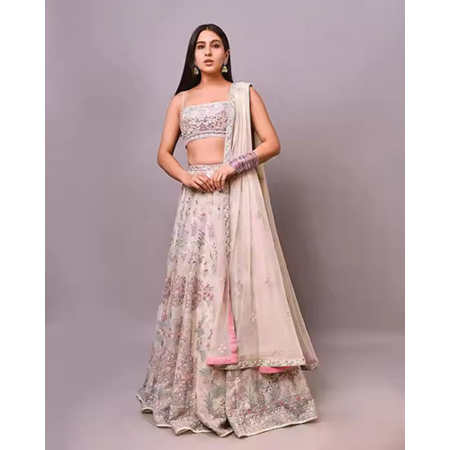 Party Wear sleeveless Blouse With Heavy Embroidered Lehenga