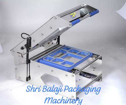 Meal Tray Sealing Machine - PP Tray Compatible, 570x360x460mm Dimensions, 350 Trays/HR Speed, Easy Peel Off Sealing Type, 600W Power, Manual Operation