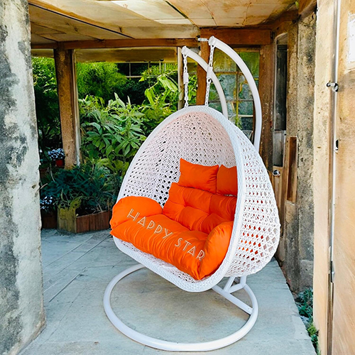 White Swing With Orange Cushion Outdoor Double Seater Swing