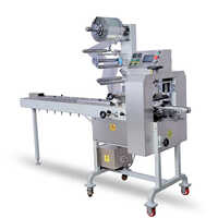 Flow Wrap Machine - 700kg Mild Steel | 440 Volt Electric Drive, 40 To 100 Ppm Automatic Wrapping Capability
