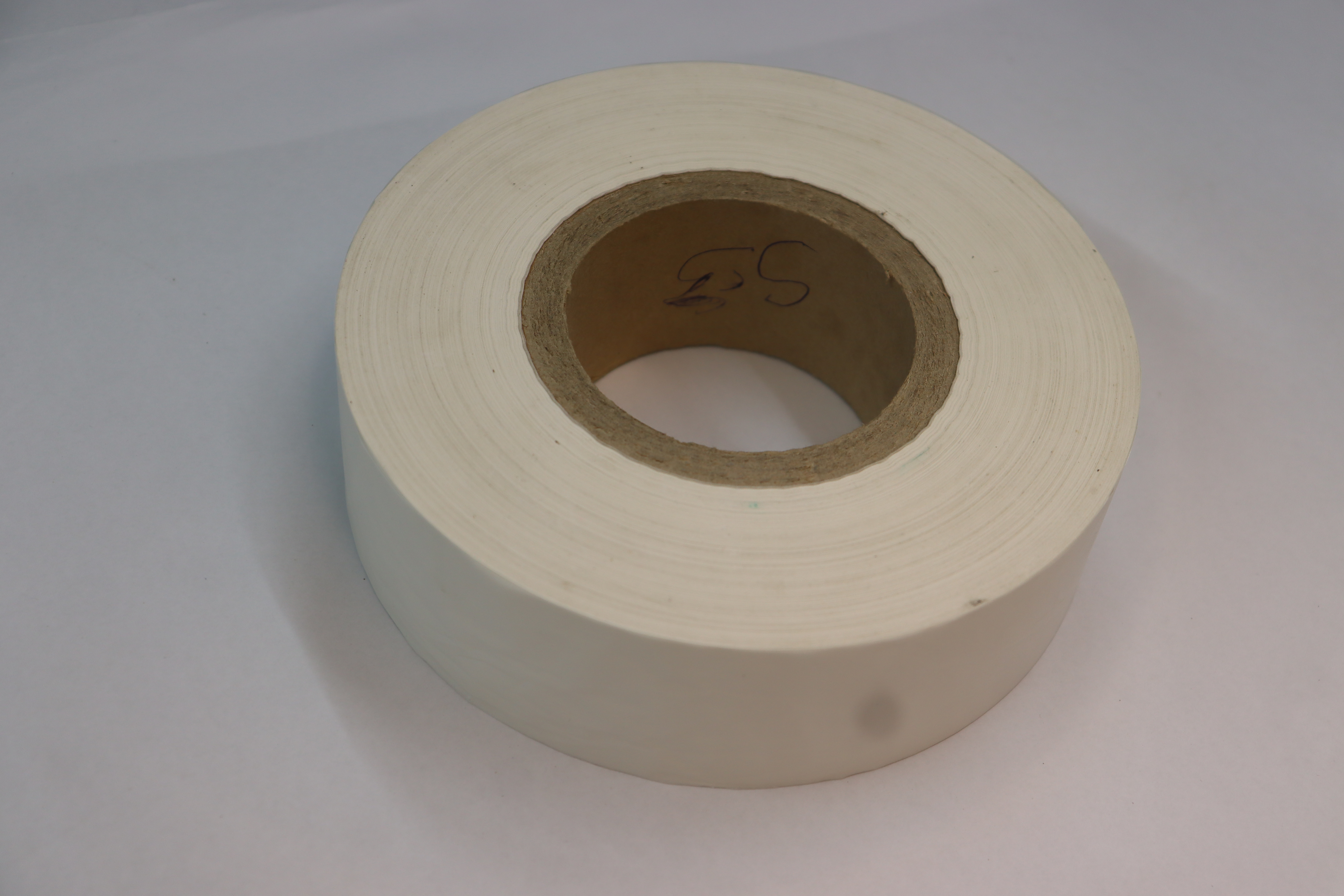 Sanitary Napkin Back Release Paper Roll - Silicone Coated, Lightweight Smooth Paper, Continuous Roll Format, Custom Sizes Available