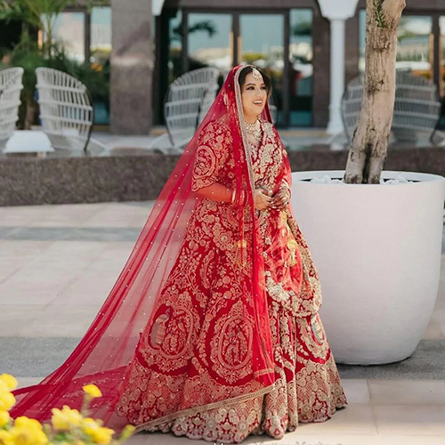 Cardinal Red Bridal Lehenga With Graceful Trail