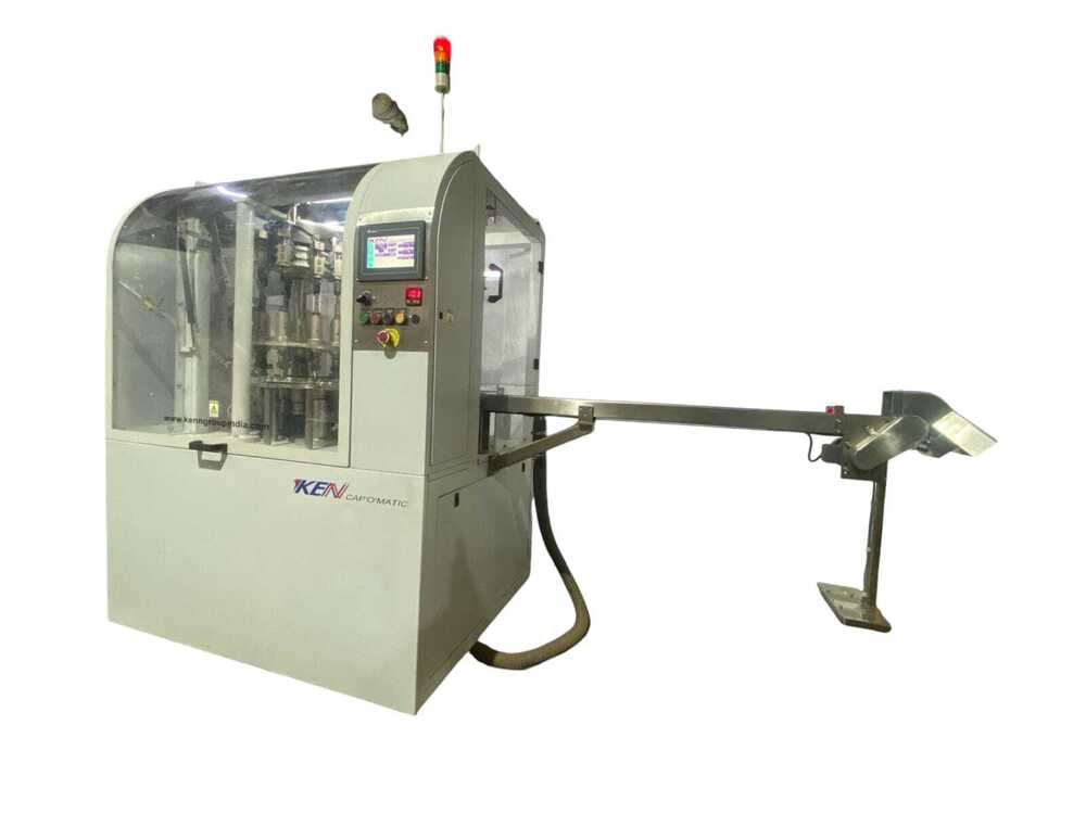 Cap Slitting and Folding Machine