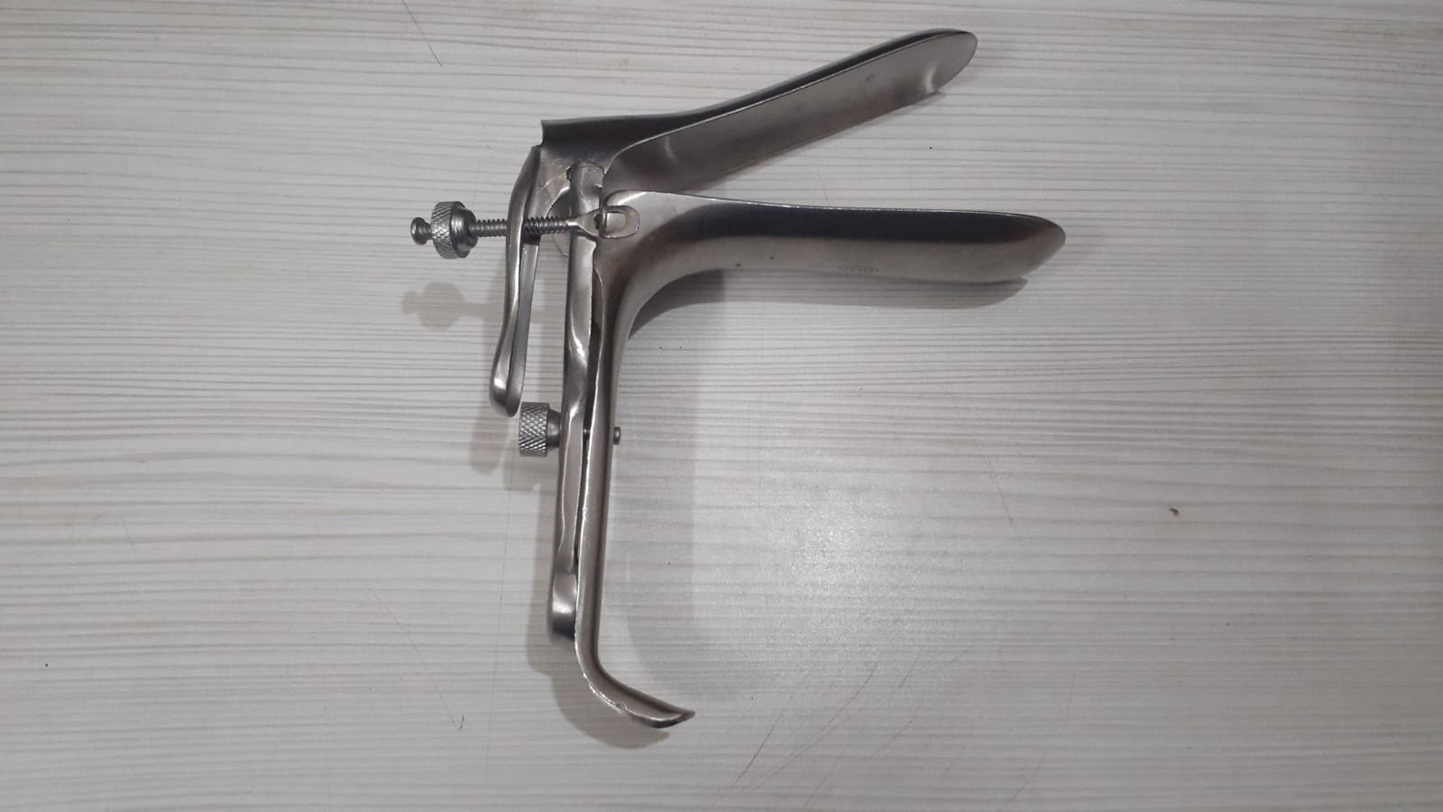 Grave sliding Speculum