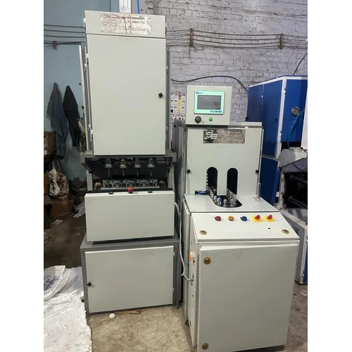 4 Cavity Semi Automatic PET Blowing Machine - 440V Electric Power Supply, New Condition, 1 Year Warranty