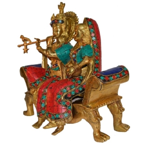 Radha Krishna Sitting On A Sofa Set With Turquoise Work