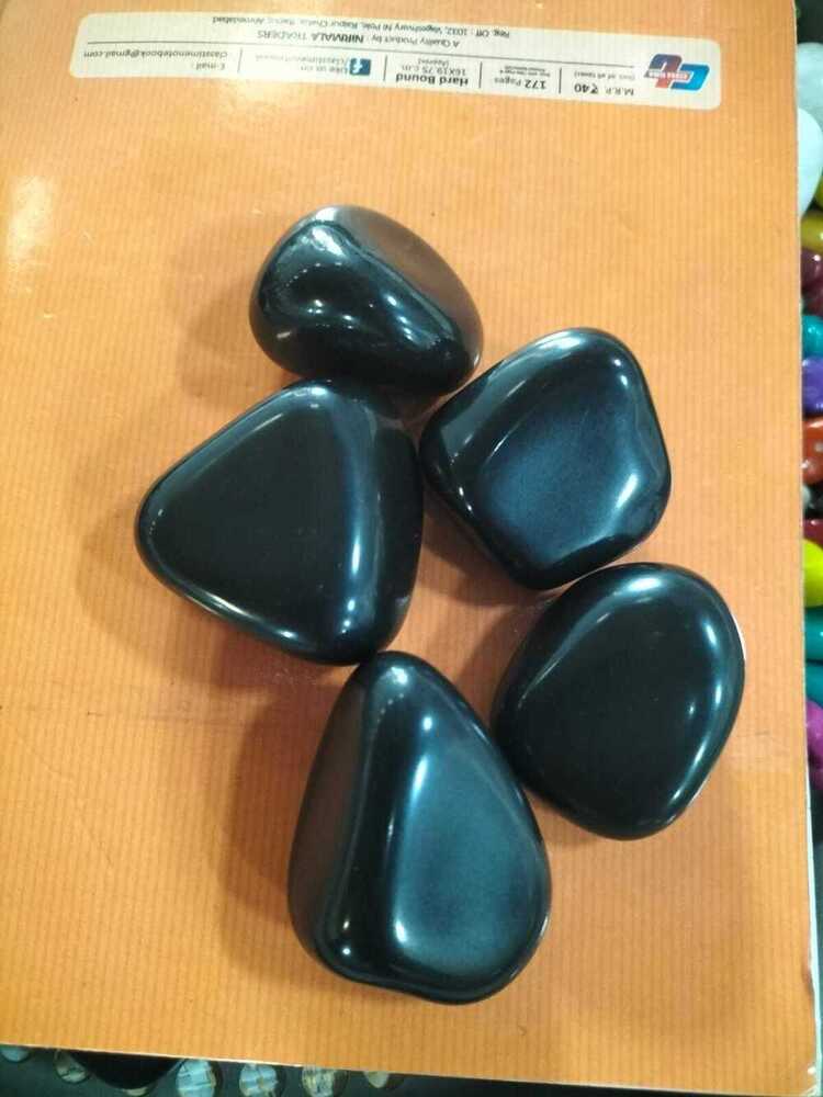 Natural jet black polished pebbles for garden decoration and home interior decoration