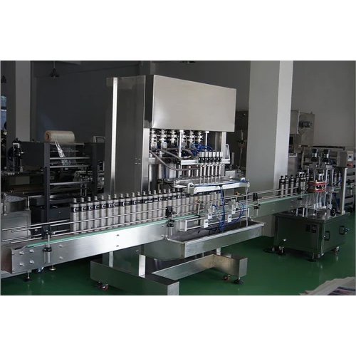 Automatic Pet Bottle Filling Machine - Grade: Industrial