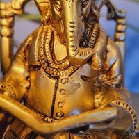 Handcrafted Brass Ganesha Idol | Sitting on Chair for Blessings & Prosperity | Elegant Brass Ganesha Murti ( Yellow, 7.5 inch)