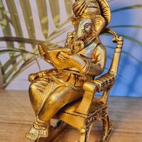 Handcrafted Brass Ganesha Idol | Sitting on Chair for Blessings & Prosperity | Elegant Brass Ganesha Murti ( Yellow, 7.5 inch)