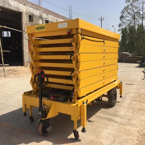 Manual Hydraulic Scissor Lift Table - 2 Tonne Capacity, 20 Feet Max Height, Strong Yellow Design | Durable Industrial Solution with Warranty