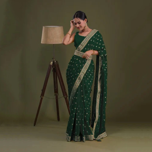 Green Sequins Semi Crepe Saree