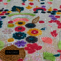 Multicolor Sequin and Blossom Floral Fabrics for Weddings and Celebrations