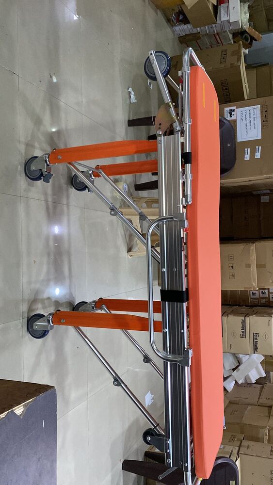 Ambulance Stretcher - Iron, 500x90x50 Cm, Orange & White | Adjustable Frame, Lightweight Design, Waterproof And Antimicrobial Covers, Safety Restraints, Lockable Wheels For Secure Transport