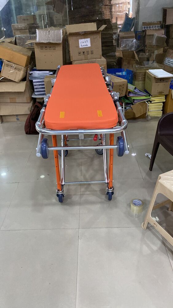 Ambulance Stretcher - Iron, 500x90x50 Cm, Orange & White | Adjustable Frame, Lightweight Design, Waterproof And Antimicrobial Covers, Safety Restraints, Lockable Wheels For Secure Transport