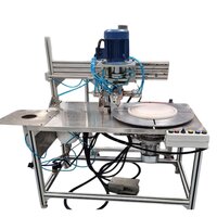 End cap gasketing machine