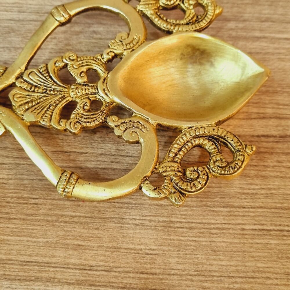 aakrati Spoon with Peacock Design Hand Carved Brass Spoon For Home Decoration Brass Table Diya  (Height: 4.4 inch)